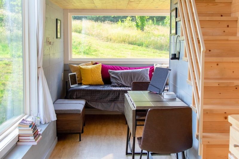 Tiny home, clever dining space layout.