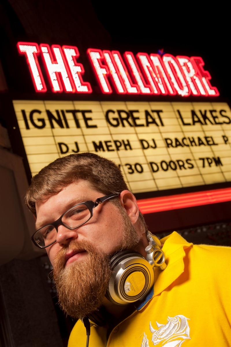 Image of team member Norm standing outside The Fillmore in Detroit.