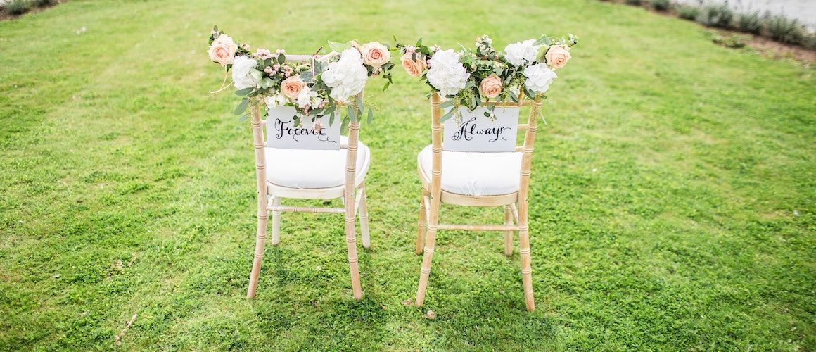 Image of bride and groom wedding seats.