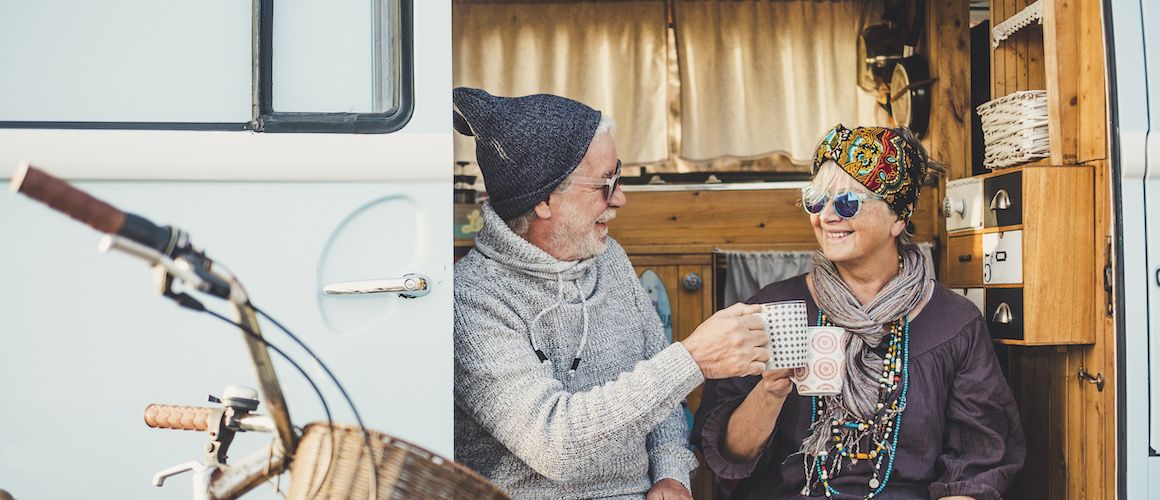 Image of couple enjoying breakfast in their tiny home.