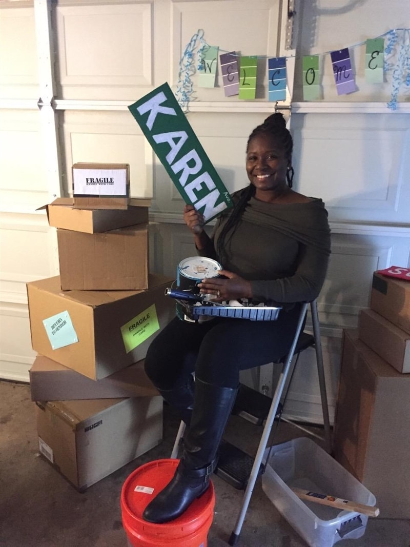 Image of guest sitting on paint steps for a "housewarming" theme party.