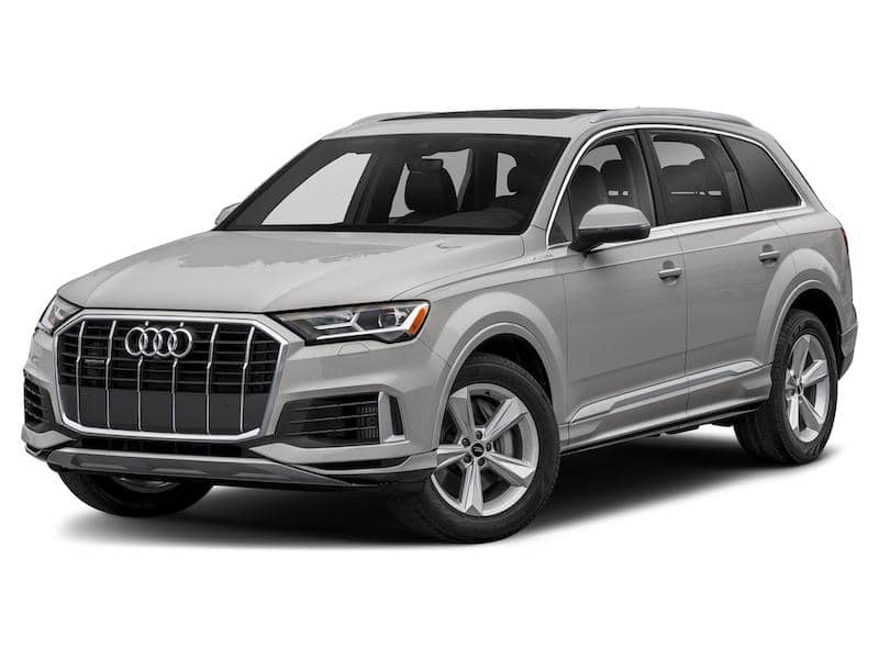 Front and side view of a light beige Audi Q7 SUV.