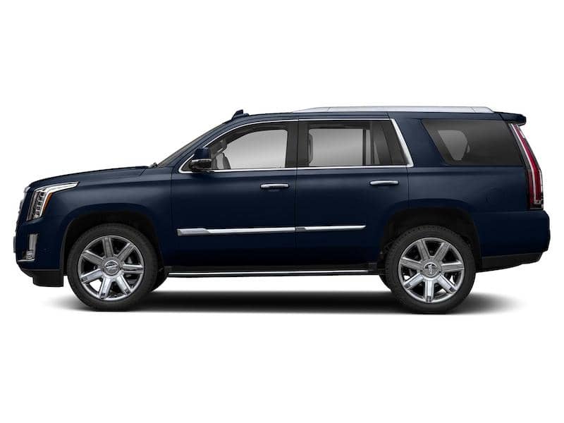 Side view of a black Cadillac Escalade SUV.