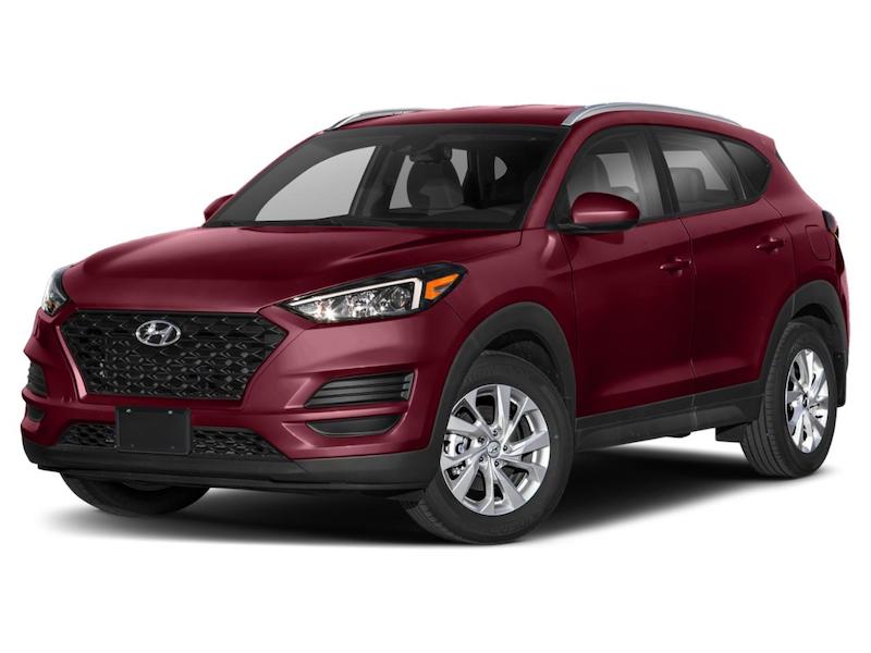 Red Hyundai Tucson front exterior view.