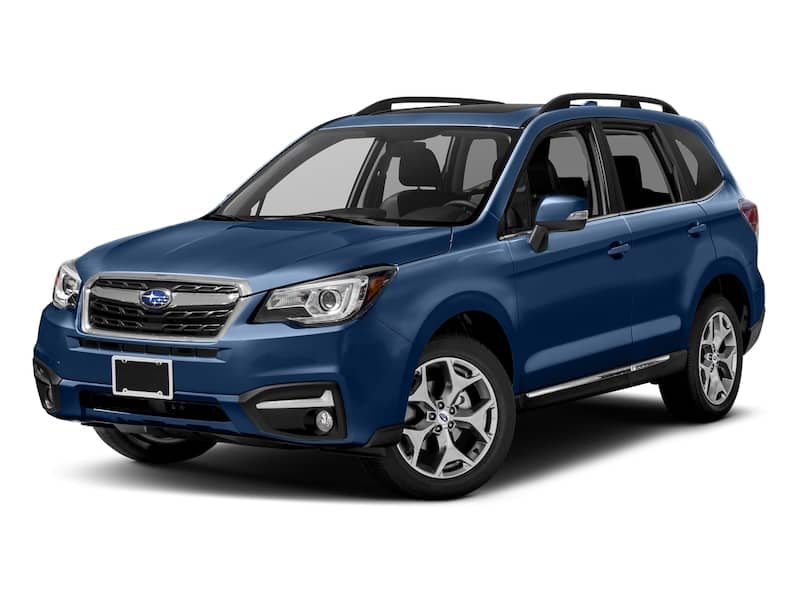 Dark blue Subaru Forester front exterior view.