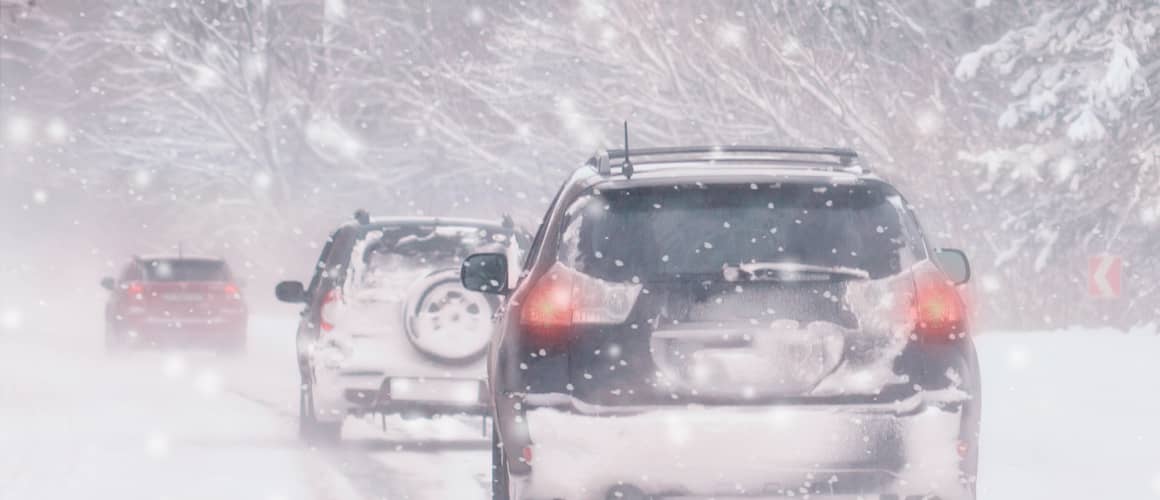 Cars Driving In Snow