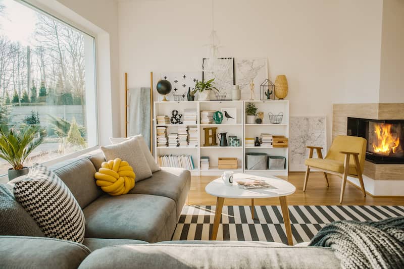 Grey living room with yellow accents.