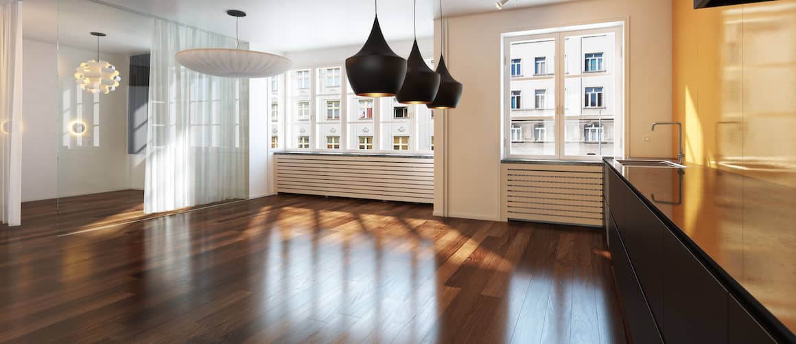 Empty interior residence with hardwood floors in the city.