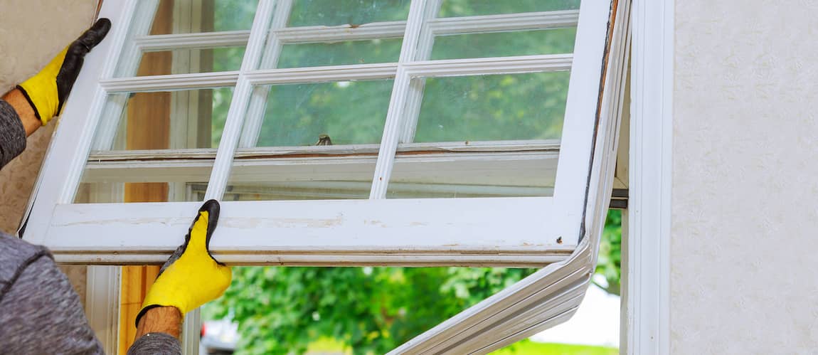 Man replacing windows.