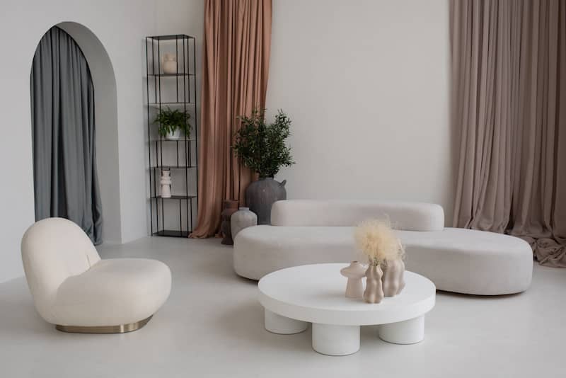 Modern white living space with sculptural art inspired pieces.