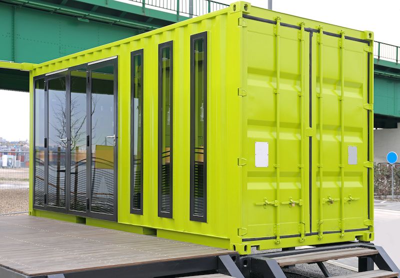 green shipping container converted to house