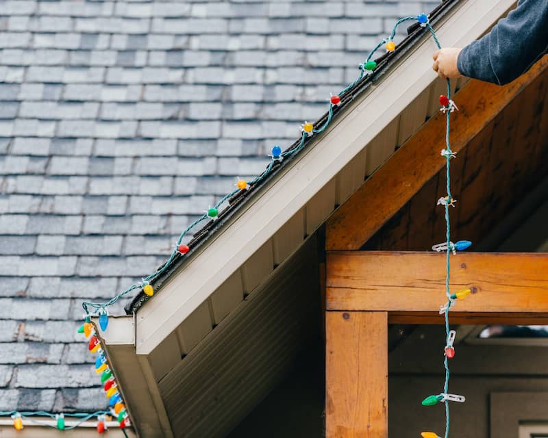 putting up Christmas lights on roof