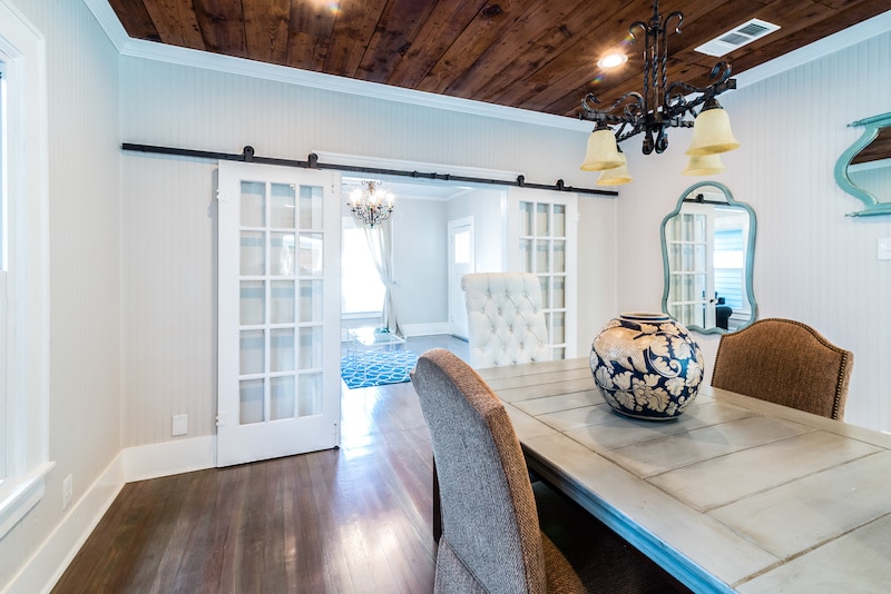 Dining room with sliding barn doors.