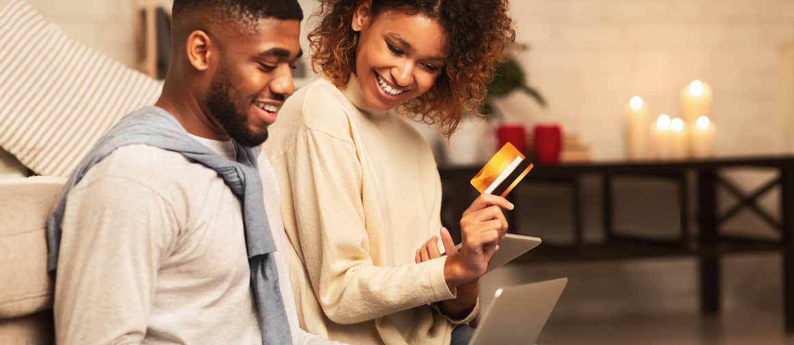 Couple Online Shopping For Furniture