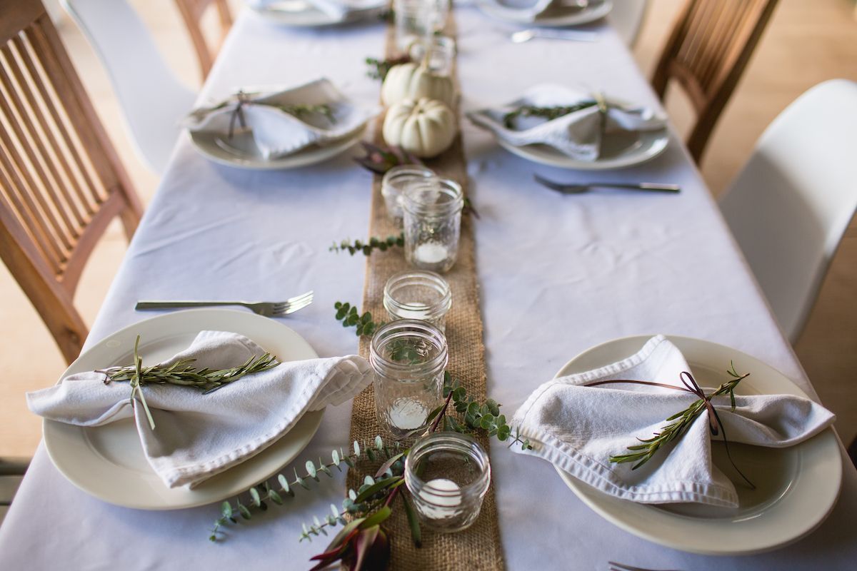 White table cloth with burlap table runner.