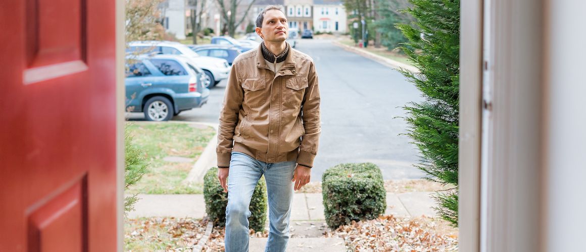 man walking into a house to tour it without a realtor
