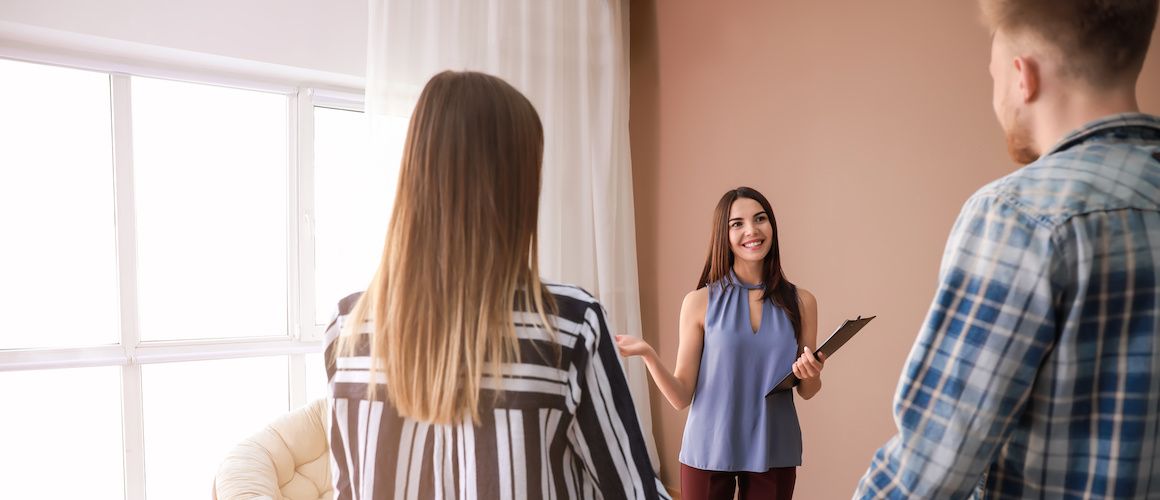 Real Estate Agent giving tour of a home