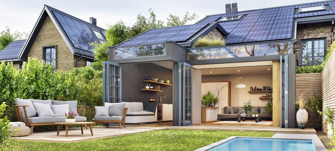 Home with open widows and solar panels.