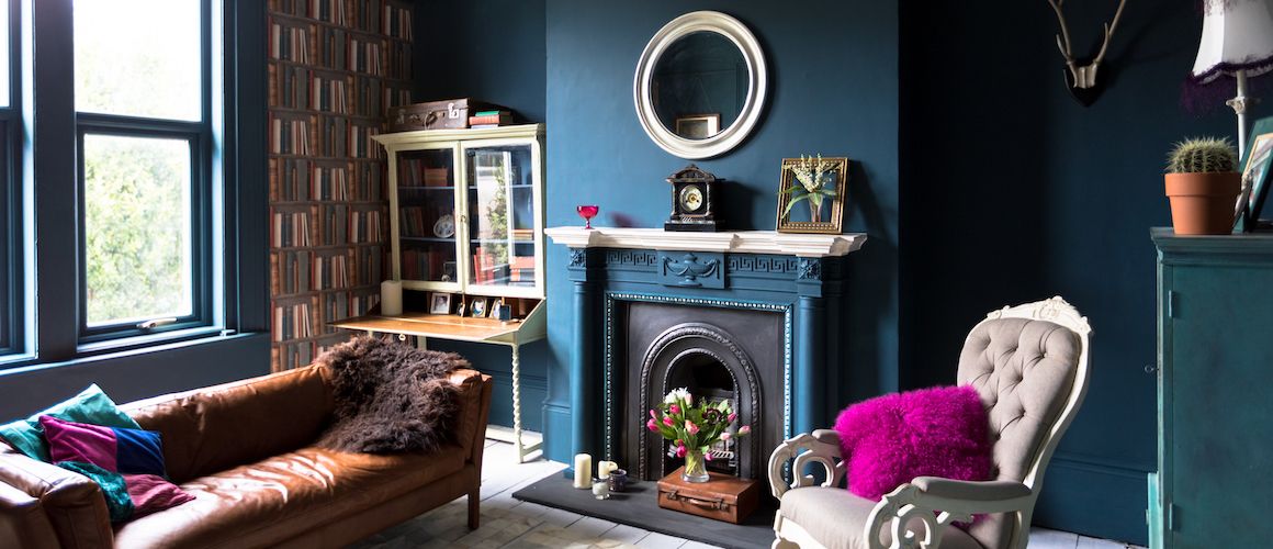 Blue room with pops of pink home decor