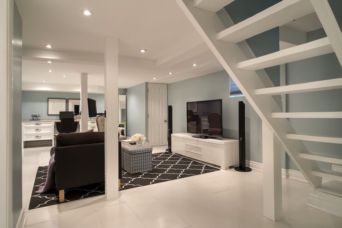 Urban bungalow living room in basement.