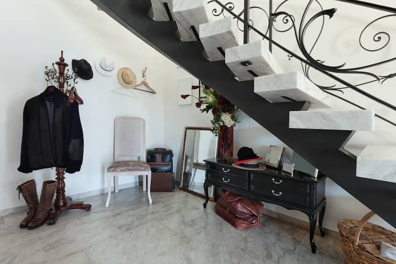 under the stairs coat closet