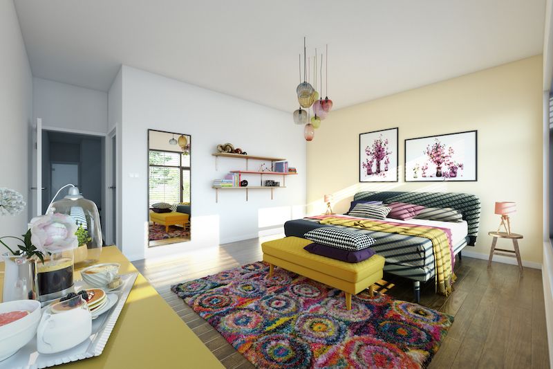 Colorful bedroom with accent rug.