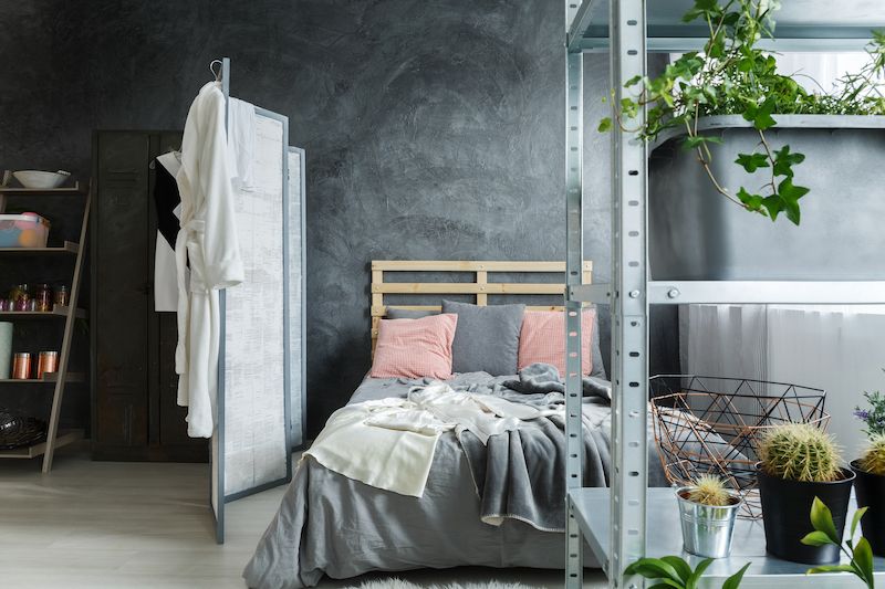 Bedroom with decorative screen.