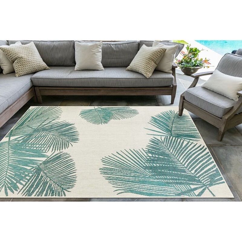 large outdoor rug with palm tree designs