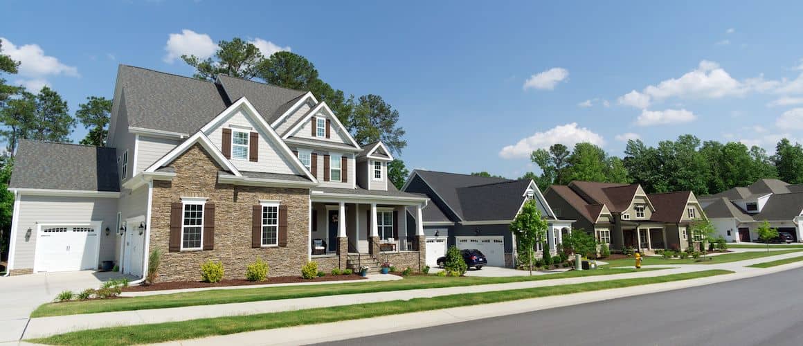 houses in the suburbs along street.