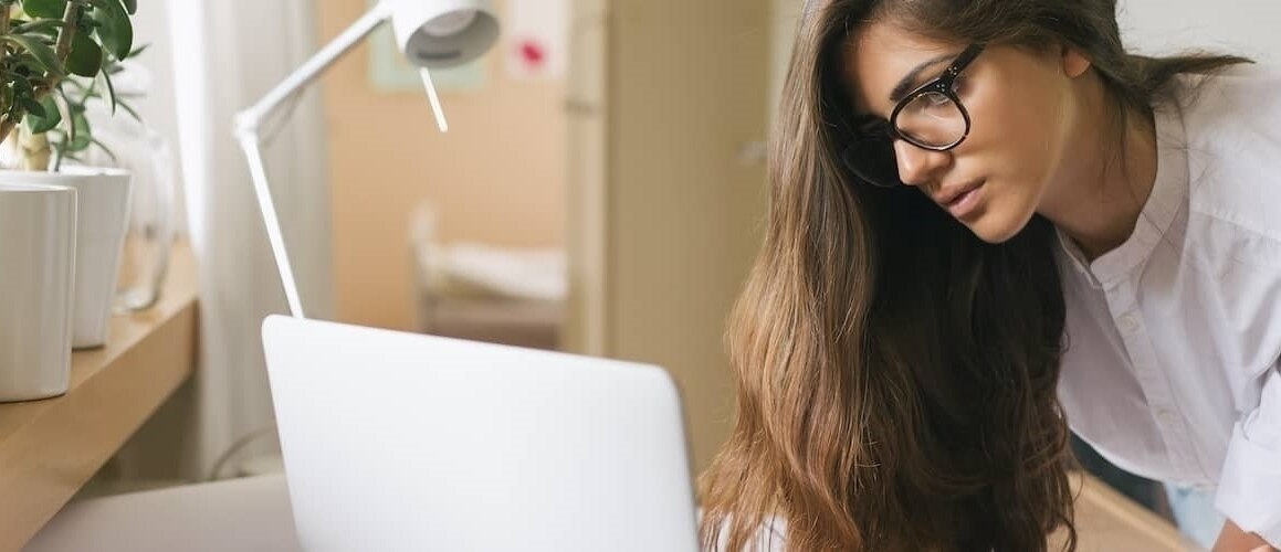 Young Woman Checking Her Credit Card Account