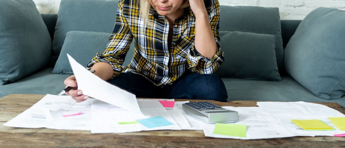 Woman looking over finances.