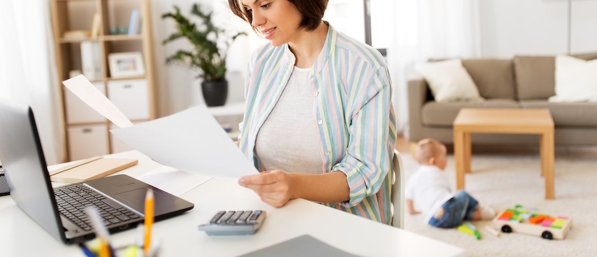 Young mom doing paperwork.
