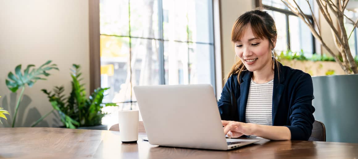 Real Estate agent on laptop working