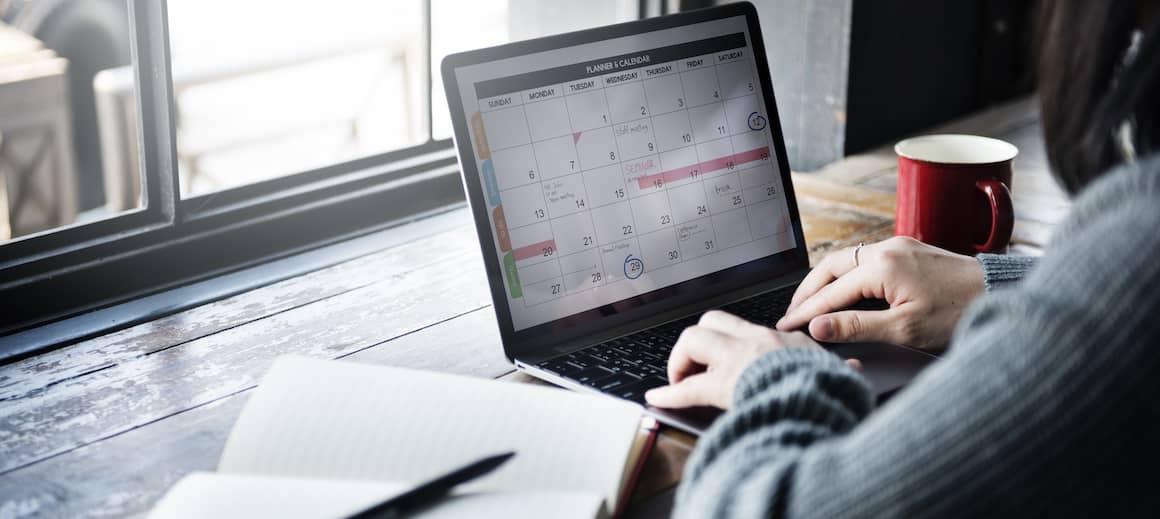 Lady Typing Laptop Calendar